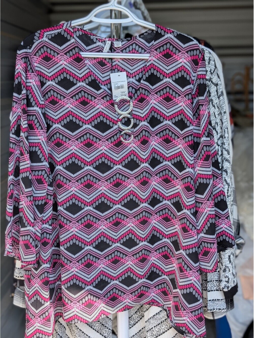 Pink geometric print tunic top